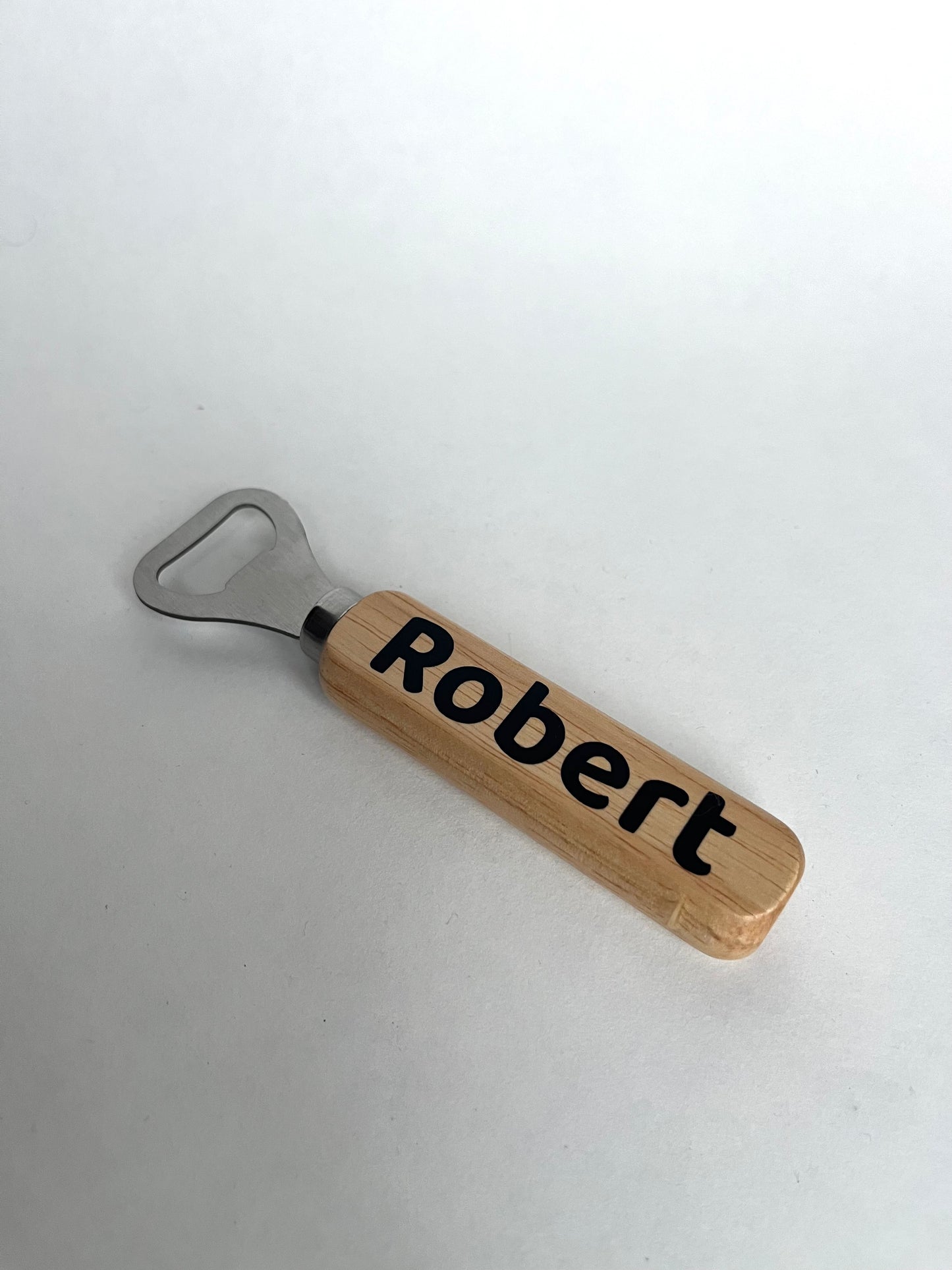 Bieropener van hout met tekst